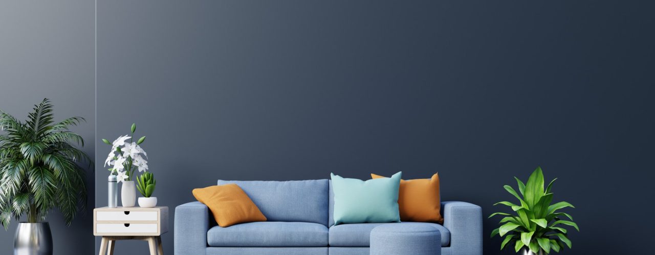 modern-living-room-interior-with-sofa-green-plants-lamp-table-dark-wall-background-min